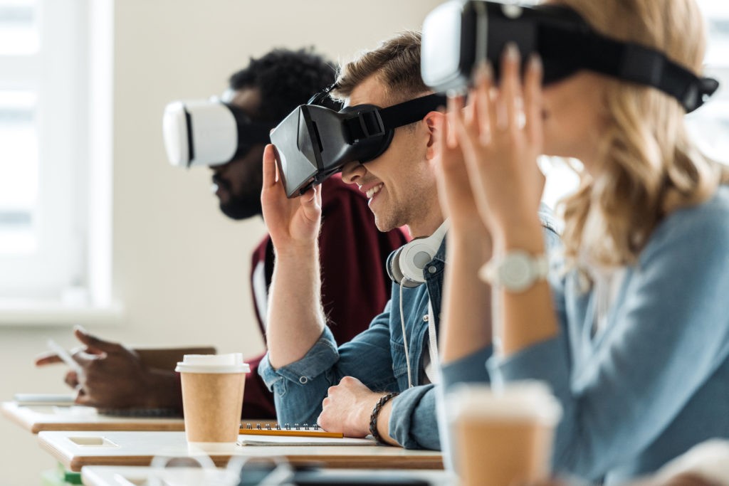 People wearing virtual reality headsets.