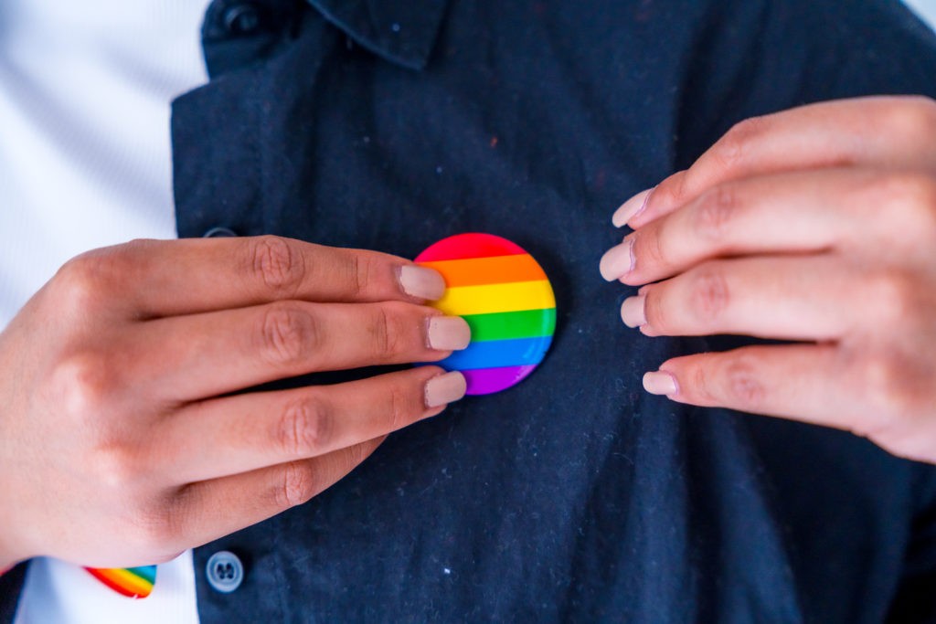 LGBTQ badge.