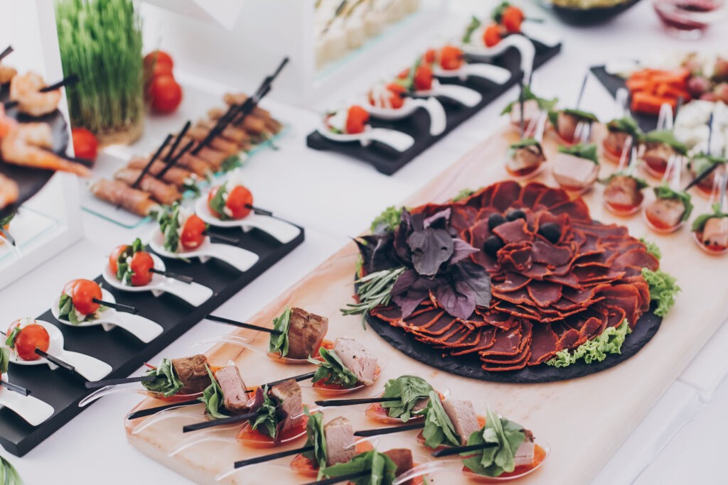 Appetisers and canapés on table at an event.