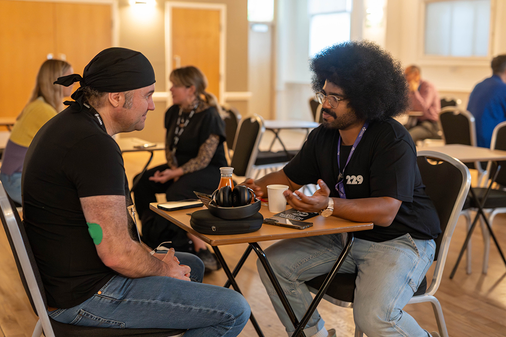 two event attendees talking in the Portland at ISH Venues