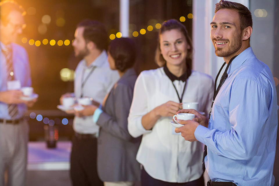 Businesspeople having coffee for a networking event