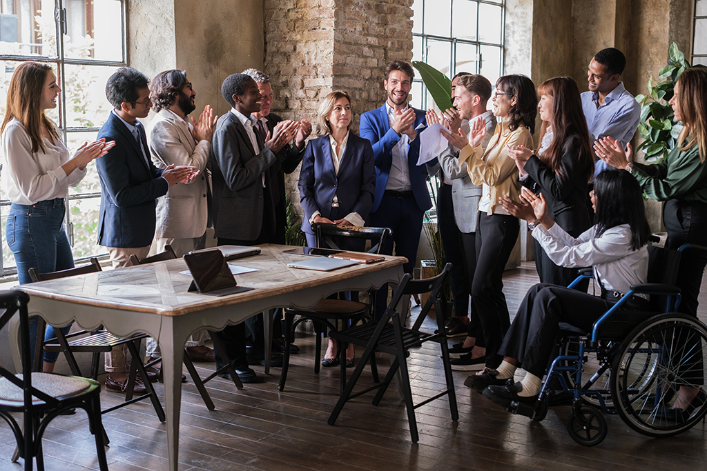 Group of businessmen applauding the successes achieved by the general manager. 